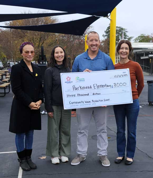 Parkmead Elementary receving their recycling grant from Republic Services